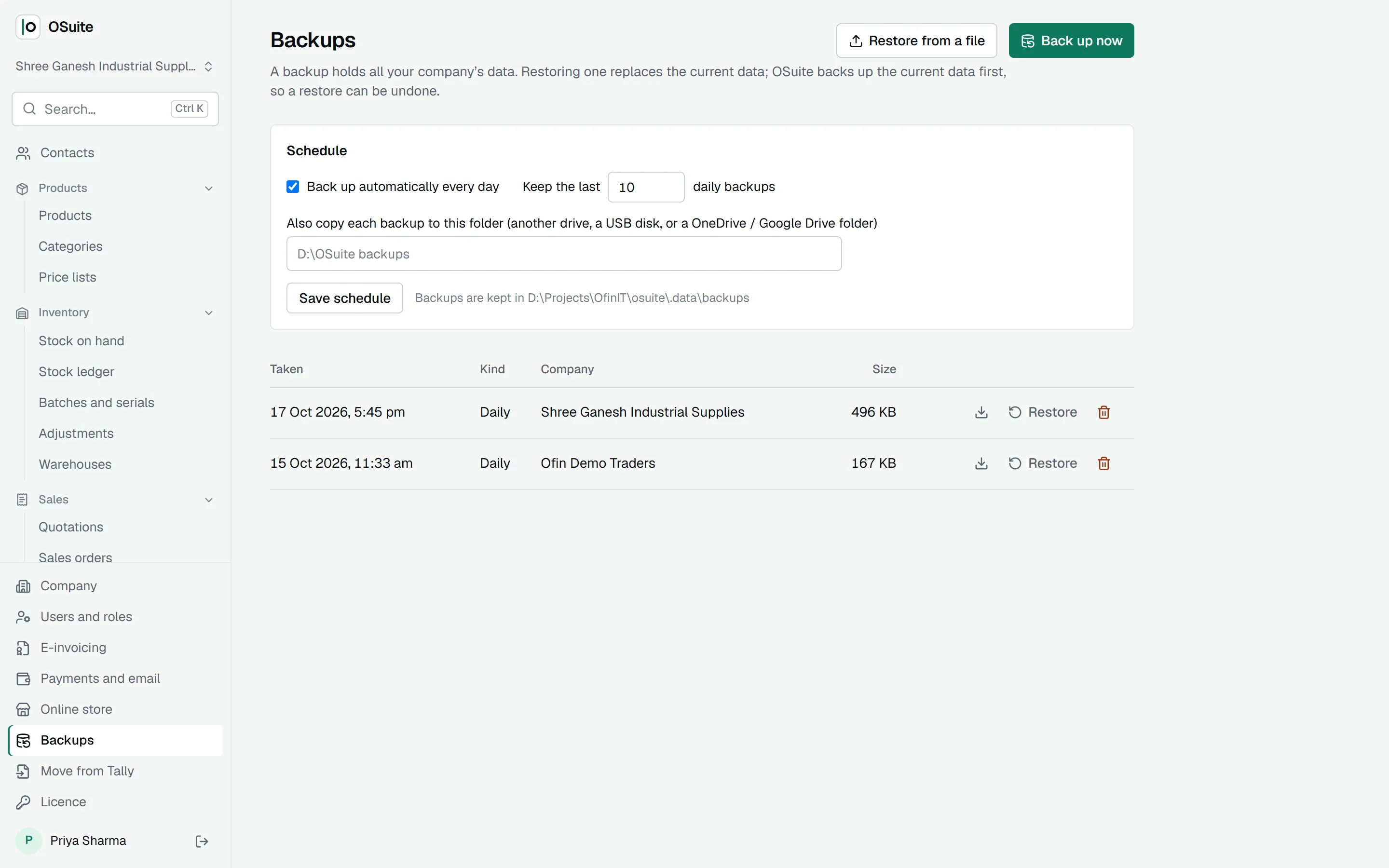 The backups screen: daily schedule, a second folder for copies, and the list of backups with restore